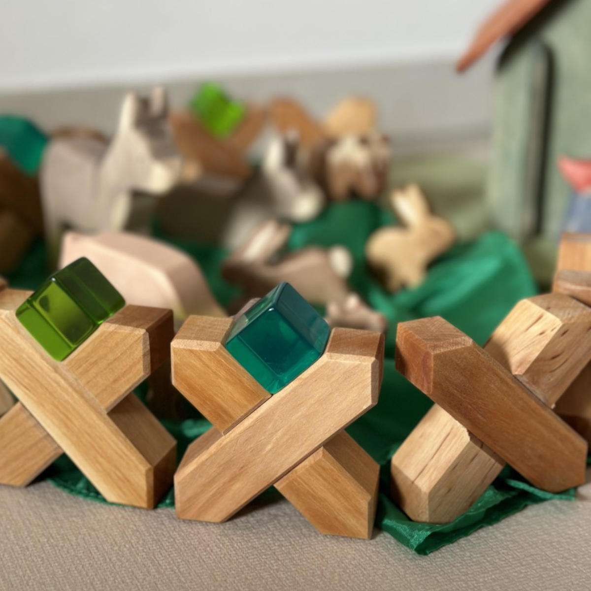 Bauspiel X-Blokken 48-delig in Holz mit grünen Akzenten - schräge Ansicht